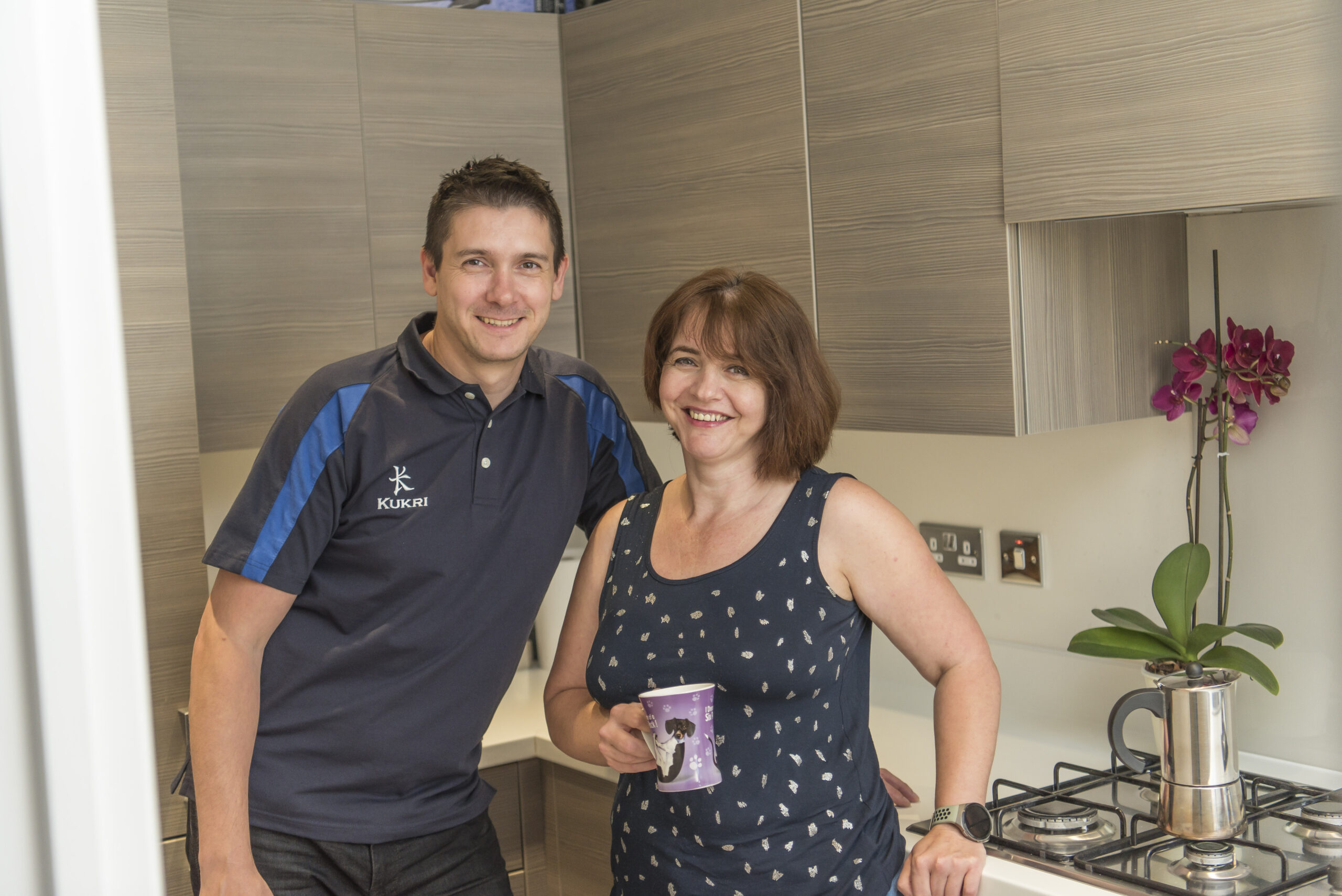 Anca and Lucian in their kitchen