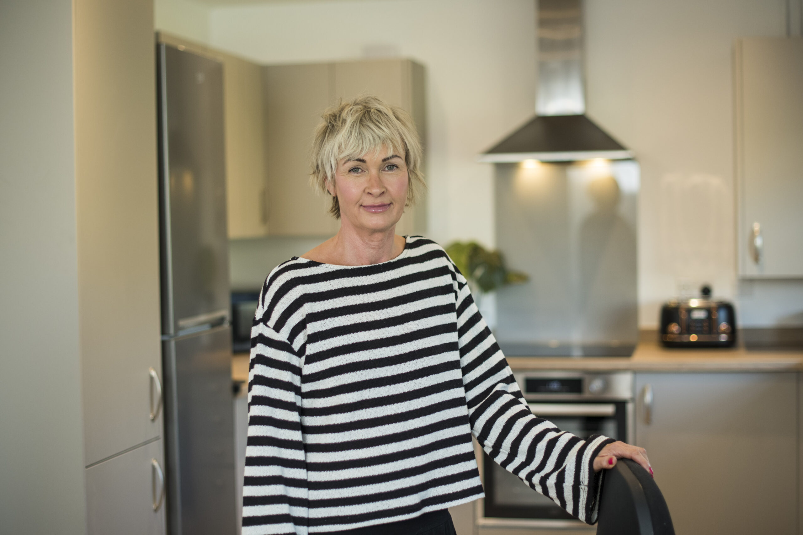 Kelly in her kitchen