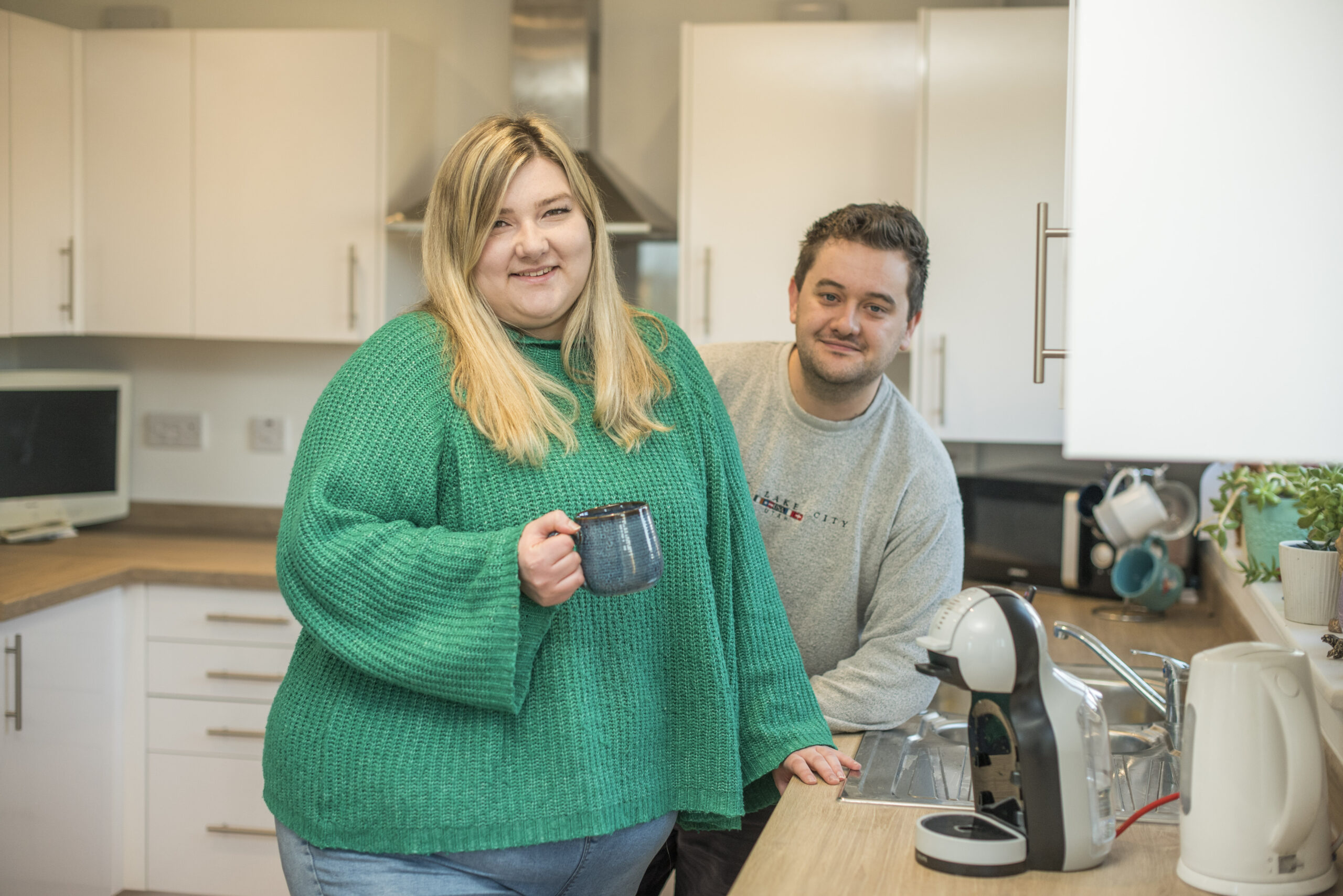 Maddison and Daniel in their kitchen